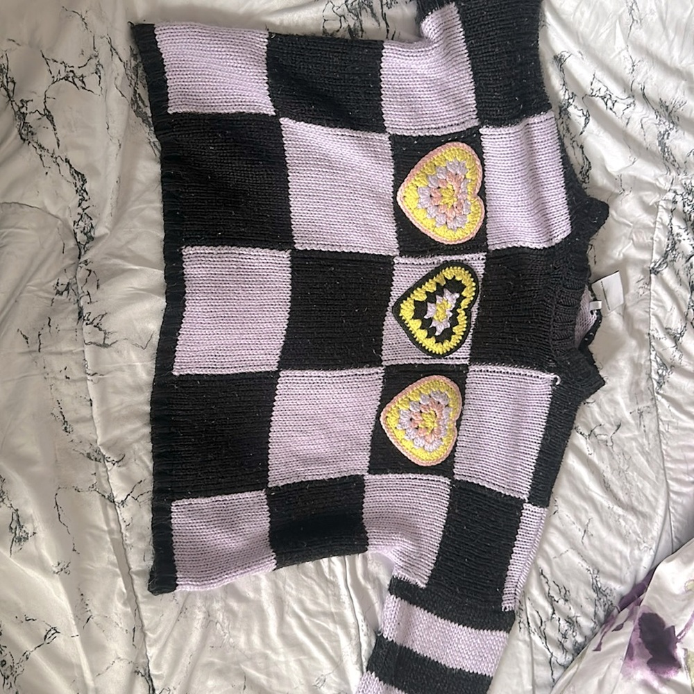 I’m selling and sweater, that I got at “ the ragged priest “ in size Xs